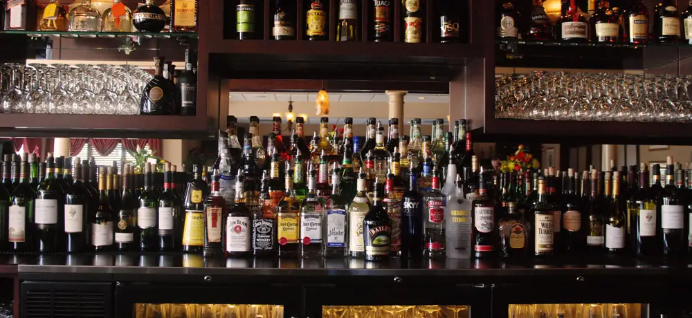 Back bar stocked with wine and spirits