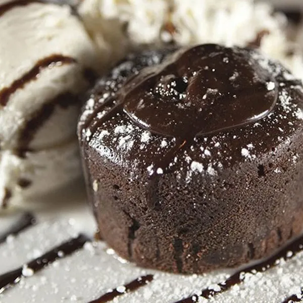 Warm chocolate molten cake with vanilla ice cream