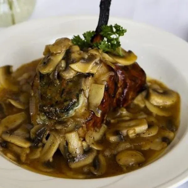 Veal with mushrooms in a savory sauce